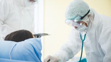 coronavirus COVID-19 virus patient having fever, epidemic, doctor and nurse in uniform