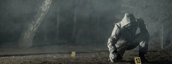 Crime Evidence Markers Placing by Forensic Officer