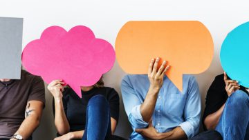 Group of diverse people with speech bubbles icons